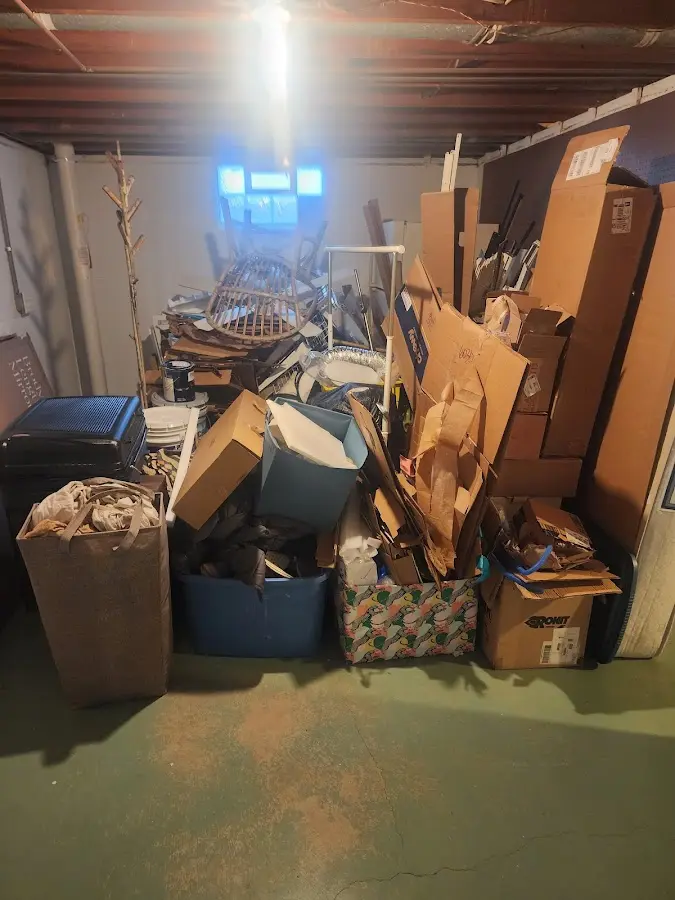 Roll-off dumpster container at job site for 2 Yard Dumpster Rental in West Caln